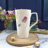 Bee and spring flower tall Mug
