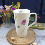 Bee and spring flower tall Mug