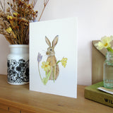 March hare and primroses Easter greetings card