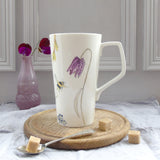 Bee and spring flower tall Mug