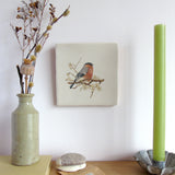 decorative wall art tile with bird and blossom