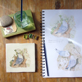 watercolour painting of nesting kittiwakes on handmade square tile