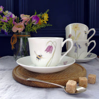 Bee and spring flowers china teacup and saucer