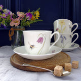 Bee and spring flowers china teacup and saucer