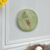 handmade ceramic butterfly and sweet pea plaque